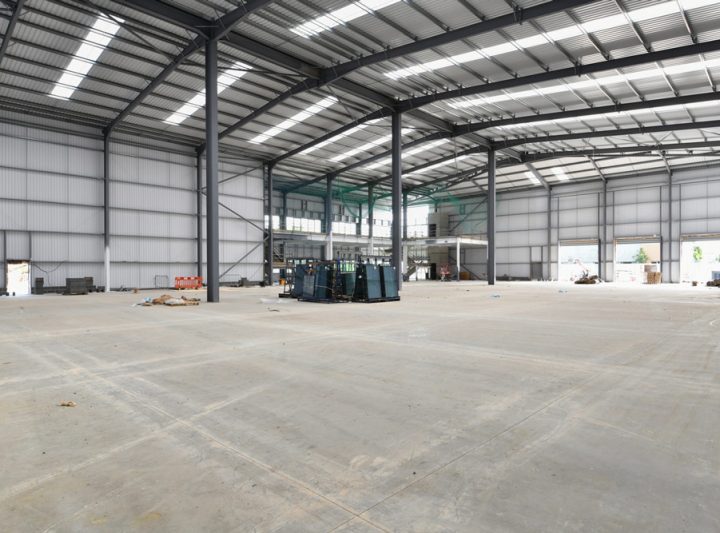 Concrete flooring for an industrial commercial space needs resurfacing for a more durable quality