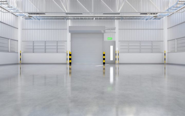 Epoxy-sealed commercial flooring shows a polished clean look and creates a reflective illusion of a wider space